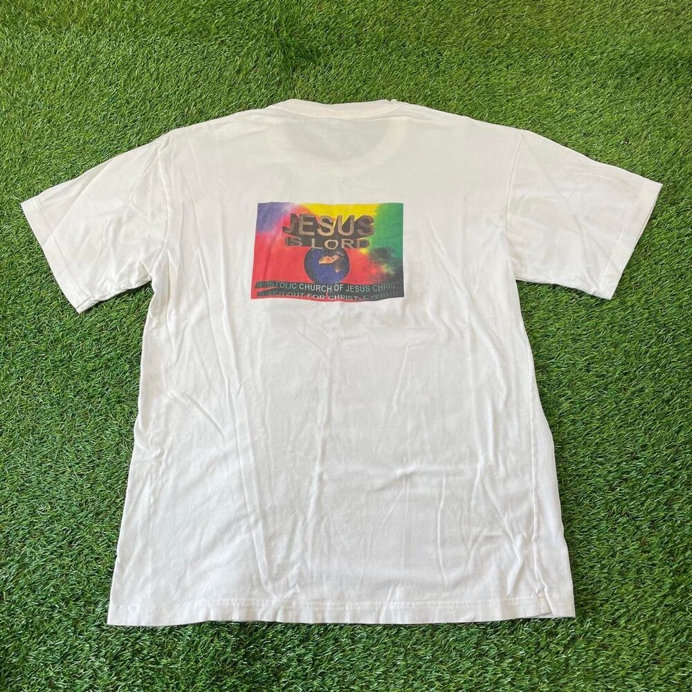 Vintage 90s Jesus is Lord white cotton t-shirt with rainbow graphic and text M/L